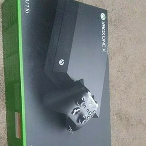 Xbox one x. Never been open. I paid 500 .